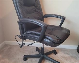 True Seating Concepts desk chair is height adjusting. The back is 43" tall. To the seat is 21" at its tallest. All wheels work. No rips or tears in the leather. The massager has multiple settings as seen on the attached remote.

https://ctbids.com/#!/description/share/752834
