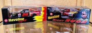 Pair of Havoline Model Race Cars. Both look to be new in the box.