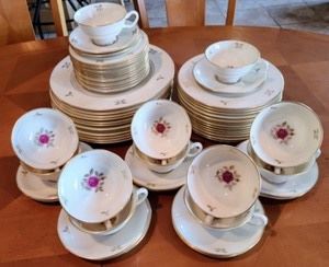 Lenox "Rhodora" Dish Set. Full Service for twelve. All appear to be in excellent condition, with no observed chips or cracks. Measurements:

Dinner Plates: 11" in diameter 

Salad Plates: 9" in diameter 

Bread Plates: 7" in diameter  