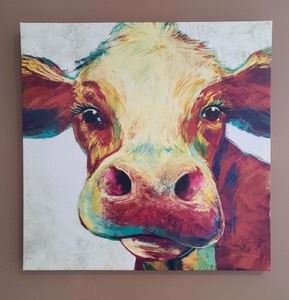 Canvas Cow Print. Fun print measures 20” x 20”.