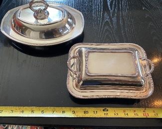 Lot 63: $45- 2 covered silver plated dishes. 8-3/4"L and 10-1/2" L