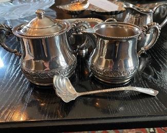 Lot 71: $45- Lot of silver plated creamer and sugar marked "W77" with sterling sugar shell, Reed & Barton s.p. creamer marked 965 and small s.p. pitcher marked Fisher K104