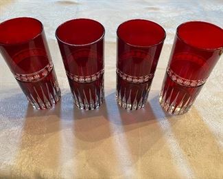 Lot 81: $45- 4 cut to clear cranberry tumblers 6"H