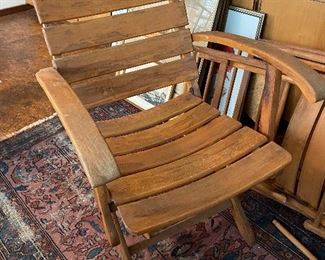 Lot  17: $200- Set of 4 folding wooden chairs from Germany.  This one has longer arms than others