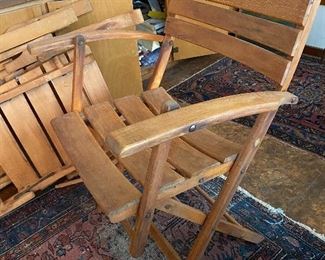 One of chairs with shorter arms