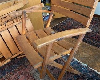 One of chairs with shorter arms