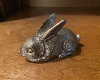 Lot 102: $20- Metal rabbit, hollow but heavy. 4-1/2"L x 2-3/4"H