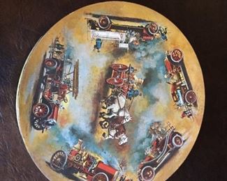 Vintage plate with trucks.