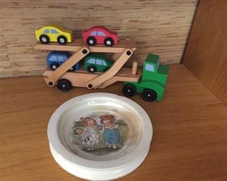 Vintage child's plate and wooden truck.