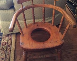 Vintage wooden potty seat.