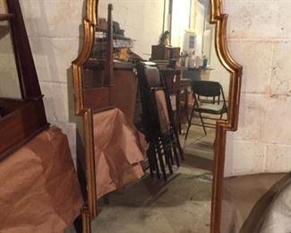 Gilded mirror.