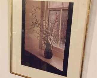 Framed print of vase with flowers.
