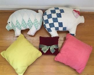 Handmade pigs and pillows.