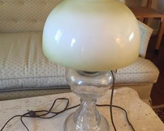 Glass lamp with globe.