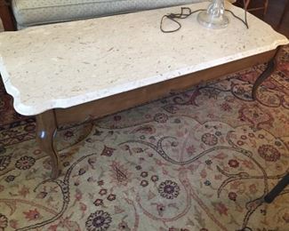 Marble top coffee table.