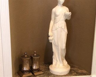 Woman with Dish Statue