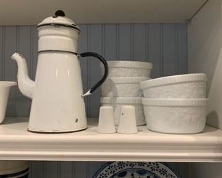The coffee pot does have all of it's parts.  The ramekins however are missing their crème Brule which honestly completely degrades their value in my opinion.