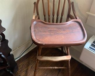 Here's the actual high chair.  How fun would it be for a family picture to take this chair and put it next to the Billiards chair, put a baby in the big chair and the dad in the little chair?  