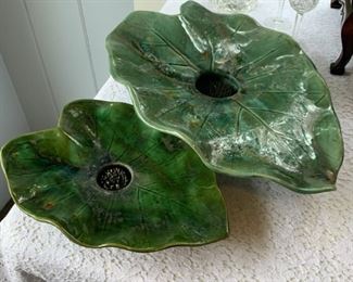 These are vintage leaf shape Ikebana pottery vases.  Ikebana is the art of Japanese flower arrangement.  There's nothing funny about that, just a bit of knowledge for you.  