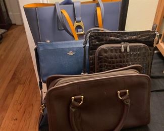 A few more purses - there's another brighton, two coach and a Dooney & Burke which honestly that brand has always sounded like a law firm to me more than a fashion house.  Dooney & Burke Attorneys At Law - no problem is too big or too small.  Fells like a Lifetime Mystery series.  