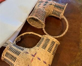 These are Choctaw Elbow baskets.  I'm sure it's because they are shaped like an elbow, but they'd also fit well on your elbow.  