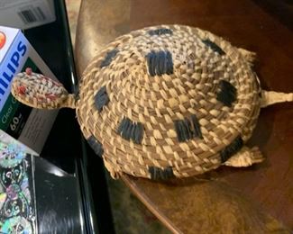 This is an adorable Coushatta Turtle Effigy basket.  I love his little head poking out!