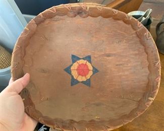 This is a Birch Bark basket with a great star detail on the inside.  