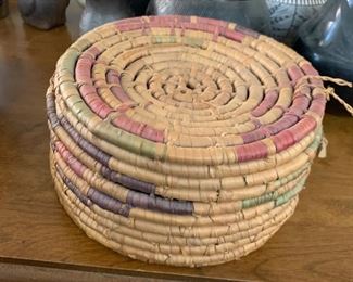 I love the purples in this lidded sweet grass basket.  Plus a lid is always good so people can't see what you hide in there.  