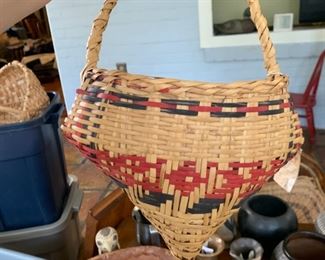 This is a Choctaw cane pointed basket woven by Elsie Battiest - a third generation basket weaver. 