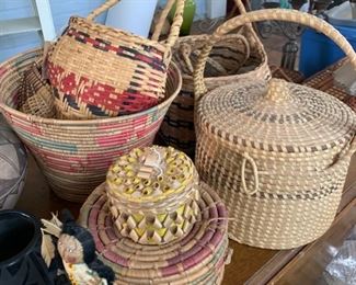 See the many baskets we have and there are probably more that I didn't get a picture of.  I know there are a few flower gathering baskets and one really awesome one I'll try to get a picture of up for y'all. 