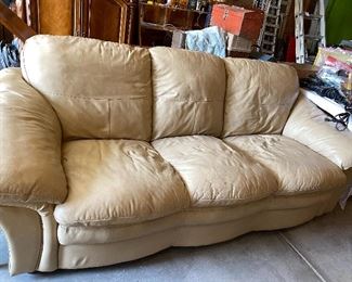 Leather sofa (worn on back)