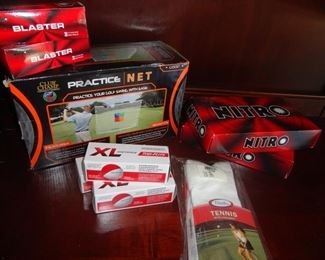 Lots of new golf balls/gloves/trophies/golf cooler and other golf misc