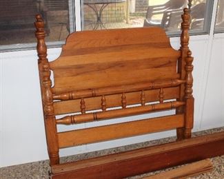 one of a pair of maple twin beds; only three rails