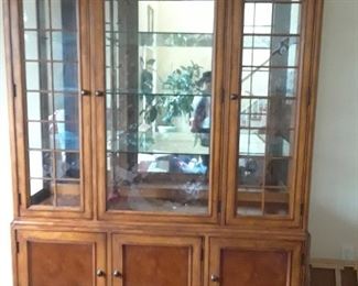Lighted china cabinet with storage below
