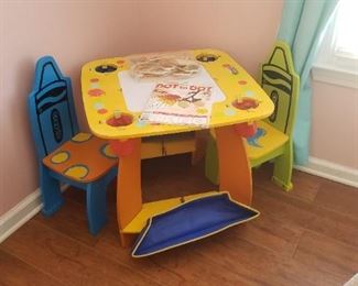 Child's table and chairs with crayon theme