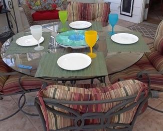 Outdoor table with glass top; 4 chairs