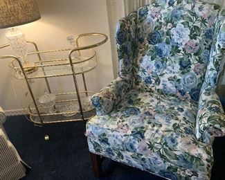 There are 2 of these floral print chairs