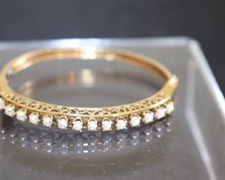 14KT Yellow Gold Bangle Bracelet with approximately 14 Seed Pearls Set in Filigree Gallery Setting. Will Ship.
