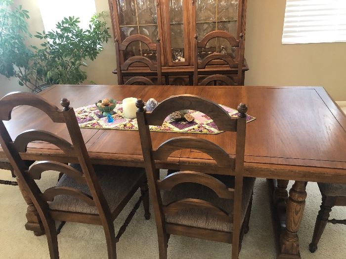 Beautiful kitchen table with six chairs. Has option of making shorter or longer, depending on your needs.