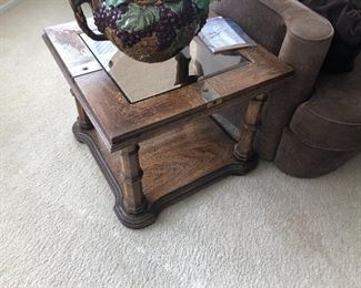 Wood, glass, and metal side tables in living room