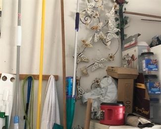 Cleaning Supplies and White Butterfly outside wall decor