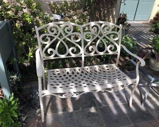 Outside wrought iron patio bench