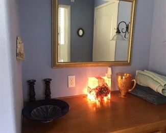 Wall mirror, bowl, light up glass cube, pitcher, and candle holders