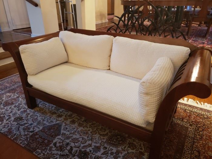 2 of 2 Hickory Chair Co. Wood Sleigh Sofa #2
This gorgeous sleigh style sofa by Hickory Chair Furniture Co. will be a statement piece in your house.  It measures 72" long, 32" in high and 20" depth. Cushions and pillows are ivory and very luxurious. Hickory Chair Co. makes some of the finest and well designed furniture pieces in the United States http://www.hickorychair.com/. Please see the matching sofa in another lot.

https://ctbids.com/#!/description/share/756837