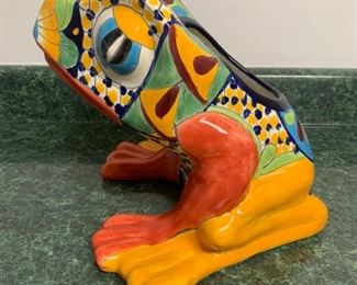 This is a Mexican made piece of ceramic depicting an artistic floral frog painting. Doesn’t have any cracks or chips and is in great condition.

https://ctbids.com/#!/description/share/755989