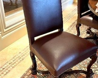 One of a set of 8 leather Dining Room Chairs