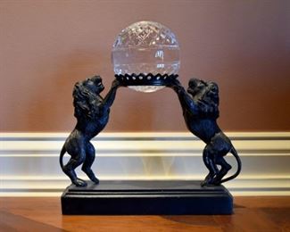 metal lions with crystal ball