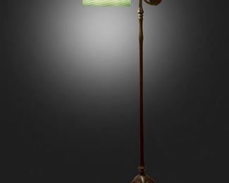 15
A Tiffany Studios Counter-Balance Floor Lamp
Circa 1902-1919; New York, NY
Shade signed: L.C.T.; Based signed: Tiffany Studios / New York / 468
The green iridescent damascene Favrile glass shade on a single-light patinated bronze counter-balance base with plain narrow stem, weighted ball in a foliate cradle, and adjustable head raised on five curved legs with spade feet, electrified
Overall: 55" H x 16" Dia.; Shade: 10.25" Dia.
Estimate: $6,000 - $8,000
