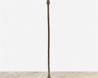 33
A Tiffany Studios Bronze And Blown Glass Candlestick
Circa 1902-1919; New York, NY
Signed: Tiffany Studios / New York / S 1457
The green blown glass capital with removable bobeche raised on a patinated bronze puddle-style "Plain" base with slender stem
17.5" H x 5.5" Dia.
Estimate: $800 - $1,200