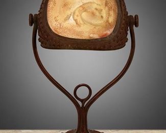 49
A Tiffany Studios "Turtle-Back" Seal Lamp
Circa 1902-1919; New York, NY
Signed: Tiffany Studios / New York / 408
The "Turtle-Back" shade with gold iridescent glass and hobnail design on a patinated bronze base with iridescent cabochons and floral motif, electrified
14.5" H x 8.5" W x 5.25" D
Estimate: $5,000 - $7,000